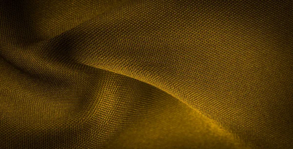 缎子黄色的花纹通常有光滑的表面和迟钝的后背 缎子织造的特点是有四个或四个以上的填充物或纬线 — 图库照片