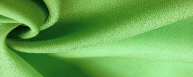 Doku, arka plan, şekil, Crepe de Chin. soluk yeşil renk, kırmızı çiçekler. Bu bir ipek grubu, pürüzle karakterize edilmiş, aynı zamanda hafif kırışık..