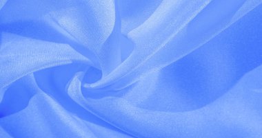 Doku, arka plan, desen, ipek mavikumaş. Krep saten arka tasarım için mükemmel bir kumaş, bir yandan bir saten bitirmek vardır, ve diğer - krep, hangi geri dönüşümlü hale getirir,