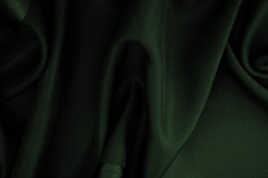 Doku, arkaplan, desen, zümrüt ipek kumaş, bu ipek saten dokuma. Yoğunluğu, pürüzsüzlüğü ve parlaklığı farklı, yumuşaklığı iyi örtülmüş. Tasarım kullan, projeler