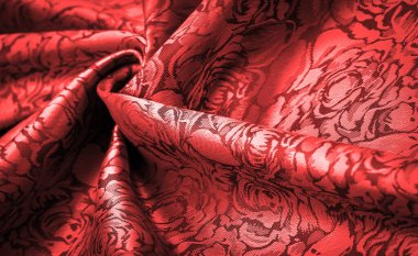 relief pattern, composite textiles, red silk fabric, with a floral pattern, unusually pleasant visual sensations: slippery, coolness, softness; beautiful appearance, unique luster;