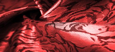 relief pattern, composite textiles, red silk fabric, with a floral pattern, unusually pleasant visual sensations: slippery, coolness, softness; beautiful appearance, unique luster;