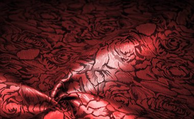 relief pattern, composite textiles, red silk fabric, with a floral pattern, unusually pleasant visual sensations: slippery, coolness, softness; beautiful appearance, unique luster;