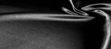 doku, arka plan, desen. Siyah ipek kumaş. Siyah ve ısıya gri ile dayanıklıdır. Herhangi bir olay için bir tasarım içine sert perde dönüştürün. Bu gevrek, hafif dokulu el.