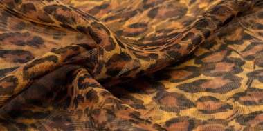 doku, ipek kumaş, leopar derisi, kahverengi-sarı siyah tonlar, sıcak Afrika safarisi,