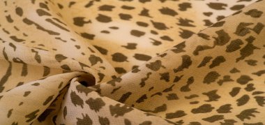 Dokusal arkaplan koleksiyonu, ipek kumaş, Afrika teması, hayvan derisi, kahverengi tonlar.