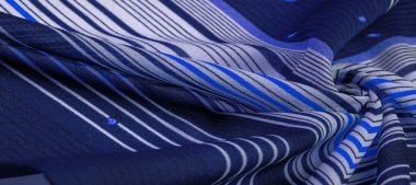 Doku deseni, koleksiyon, ipek kumaş, yeşil arka plan, çizgili beyaz ve mor çizgiler, Meksika teması, Meksika panço kostümleri.