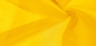 Doku, arka plan, desen, sarı ipek kumaş. Bu ipek inanılmaz derecede zarif. Bu yapılan projeler uzun bir süre sürecek ve hala oldukça iyi durumda olacak.