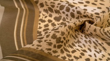 Dokusal arkaplan koleksiyonu, ipek kumaş, Afrika teması, hayvan derisi, kahverengi tonlar.