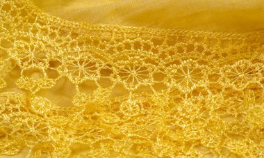 Doku, arkaplan, desen, kartpostal, ipek kumaş, dantel ambalajlı kadın sarı atkısı. Yazdırma ve dijital materyallerinizi oluşturmak için bu süslü resimleri kullanın.