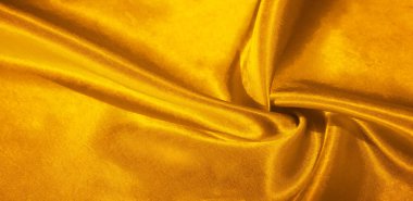 Doku, arkaplan, desen, sarılı ipek kumaş. Bu sevimli, yumuşak ve parlak kumaşın pürüzsüz bir vizon yüzeyi var. Projelerinizi yaratmak için mükemmel..