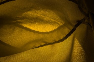 Doku, arkaplan, desen, saten sarı sepia genellikle parlak bir yüzeye ve donuk bir sırta sahip bir dokumadır, saten dokuma dört ya da daha fazla dolgu ipliği ile karakterize edilir.