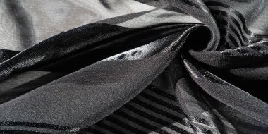 Arka plan dokusu, desen, koleksiyon, farklı boyutlarda çizgileri olan şeffaf ipek kumaş, siyah, zarif lüks.