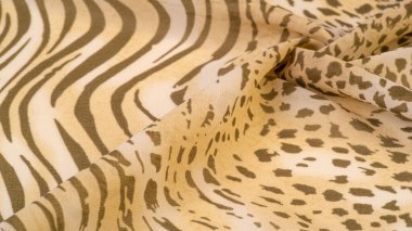 Dokusal arkaplan koleksiyonu, ipek kumaş, Afrika teması, hayvan derisi, kahverengi tonlar.