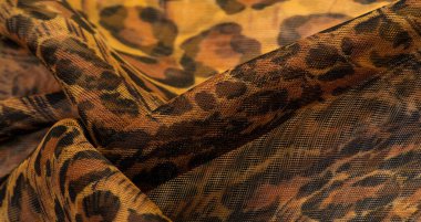 doku, ipek kumaş, leopar derisi, kahverengi-sarı siyah tonlar, sıcak Afrika safarisi,