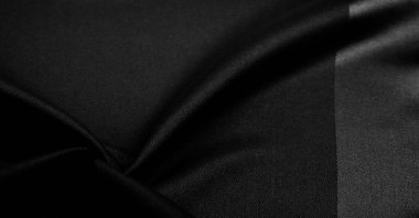 Doku, arkaplan, desen, siyah ipek kumaş, bu ipek saten dokuma. Yoğunluğu, pürüzsüzlüğü ve parlaklığı farklı, yumuşaklığı iyi örtülmüş. Tasarım kullan, projeler