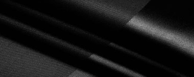 Doku, arkaplan, desen, siyah ipek kumaş, bu ipek saten dokuma. Yoğunluğu, pürüzsüzlüğü ve parlaklığı farklı, yumuşaklığı iyi örtülmüş. Tasarım kullan, projeler