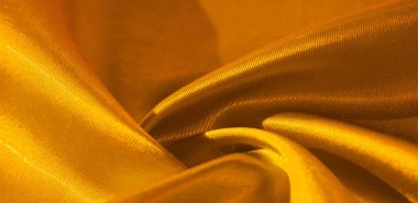 Doku, arkaplan, desen, sarılı ipek kumaş. Bu sevimli, yumuşak ve parlak kumaşın pürüzsüz bir vizon yüzeyi var. Projelerinizi yaratmak için mükemmel..