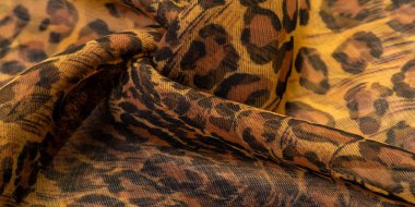 doku, ipek kumaş, leopar derisi, kahverengi-sarı siyah tonlar, sıcak Afrika safarisi,