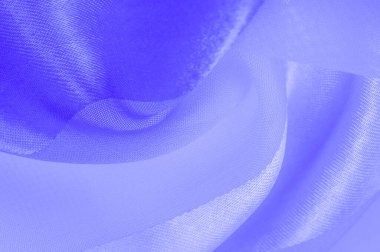 Doku, arkaplan, metalik parıltılı mavi ipek çizgili kumaş. Eğer kötü bir ruh halin varsa, bu kumaş onu eşi görülmemiş yüksekliklere taşıyacaktır. Projeniz başarılı olacak..