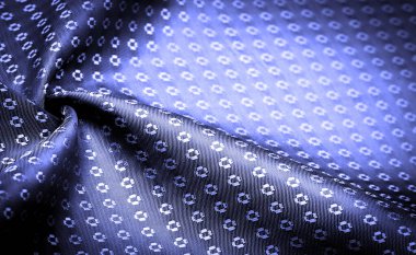 Arkaplan dokusu, dekoratif süs, gökyüzü mavisi ipek kumaş, mavi safir, ince, güçlü, yumuşak, parlak lifler koza yapımında ipek böcekleri tarafından üretilir ve iplik ve kumaş yapımında toplanır..