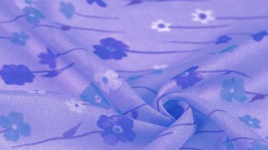 Arkaplan deseni, ipek kumaş, eflatun arkaplanda küçük çiçekler, baskılı ince bir gök mavisi rengi. Çiçek tasarımı