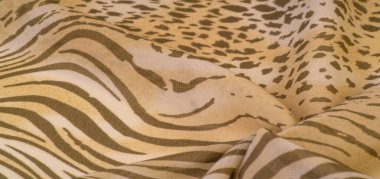 Dokusal arkaplan koleksiyonu, ipek kumaş, Afrika teması, hayvan derisi, kahverengi tonlar.