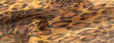 doku, ipek kumaş, leopar derisi, kahverengi-sarı siyah tonlar, sıcak Afrika safarisi,