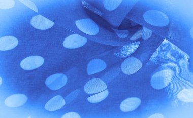 Arkaplan dokusu, dekoratif süs, mavi benekli ipek kumaş, kumaşın şekli veya silindiri andıran yuvarlak noktalar..