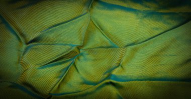 desen, desen, desen, çikolata, ipek kumaş, sıkı dokuma, fotoğraf stüdyosu. Yeşil, yeşil-sarı, açık yeşil kumaş rengi, ışık ve gölge oyunu bu fotoğrafı eşsiz kılıyor.,