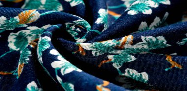 Doku, arka plan, desen, çiçek yeşil renkleri ile kumaş mavi. Olasılıklarınız sonsuzdur! Cesaret ve başarı senin olacak.!