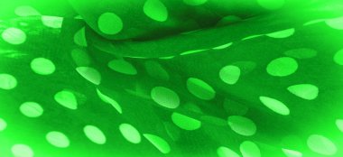 Arkaplan dokusu, dekoratif süs, yeşil benekli kumaş, kumaş üzerindeki yuvarlak noktalar şekilli ya da yaklaşık olarak bir daire ya da silindir gibi..