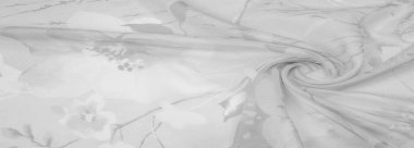 Doku, arka plan, gri çiçekli beyaz ipek süs. Kumaşın bir Jacquard dokuması var. Bu kumaş sayesinde yumuşak bir şekilde parıldayan saten bölümler elde etti.