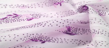 Doku arka planı, kadın şalı. Gülüşünde kırmızı çiçekler, hafif eşarplar, plaj havluları İnternet için zarif bir tasarım: moda çiçekleri, desenler, şallar.,