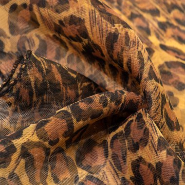 doku, ipek kumaş, leopar derisi, kahverengi-sarı siyah tonlar, sıcak Afrika safarisi,