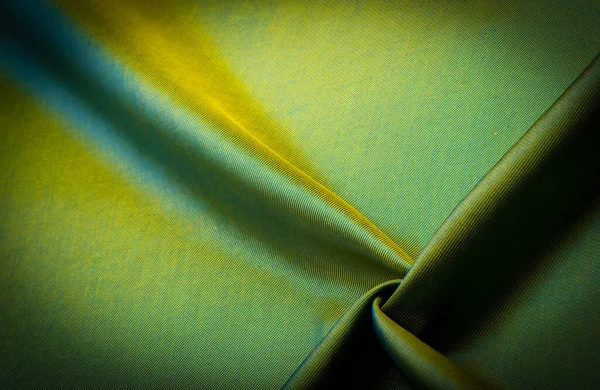 テクスチャ パターン パターン チョコレート シルク生地 タイト織 写真スタジオ チャートルーズ生地の色 光と影の遊びはこの写真をユニークにします — ストック写真
