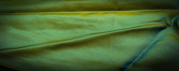 テクスチャ パターン パターン チョコレート シルク生地 タイト織 写真スタジオ チャートルーズ生地の色 光と影の遊びはこの写真をユニークにします — ストック写真
