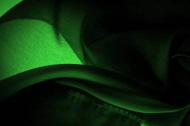 Doku, arkaplan, desen, saten yeşili genellikle parlak bir yüzeye ve donuk bir sırta sahip bir dokumadır, saten dokuma dört ya da daha fazla dolgu ipliği ile karakterize edilir.,