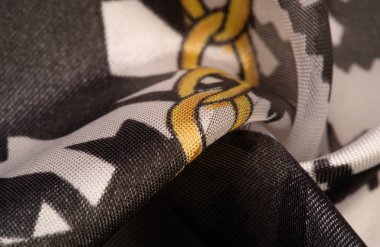 Arkaplan dokusu, dekoratif süs, ipek kumaş tarçın bej ve sarı, resim, geometrik, çiçekli veya diğer elementlerin kombinasyonunun grafik dekorasyonu.