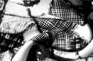 doku, arkaplan, desen. Siyah soyut figürlü beyaz kumaş. İlham her projenin özünde yatar. Güzel bir tasarım yapsanız da yapsanız da fark etmez.,