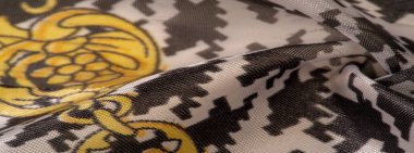 Arkaplan dokusu, dekoratif süs, ipek kumaş tarçın bej ve sarı, resim, geometrik, çiçekli veya diğer elementlerin kombinasyonunun grafik dekorasyonu.