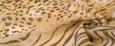 Dokusal arkaplan koleksiyonu, ipek kumaş, Afrika teması, hayvan derisi, kahverengi tonlar.