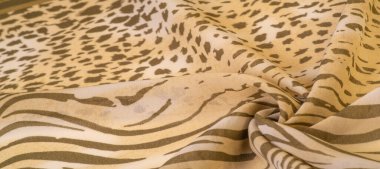 Dokusal arkaplan koleksiyonu, ipek kumaş, Afrika teması, hayvan derisi, kahverengi tonlar.