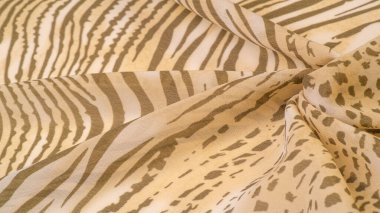 Dokusal arkaplan koleksiyonu, ipek kumaş, Afrika teması, hayvan derisi, kahverengi tonlar.