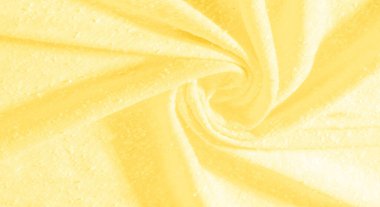 arka plan, desen, doku, süs, vintage. yapay granüller ile sarı kumaş. pelet rulo. Bu yüksek kaliteli, hafif, pürüzsüz kollu streç pamuklu kumaş