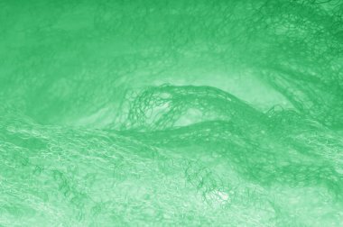 Örgü yeşilli kumaş. Dekorasyon ve tasarım için ruhani parlaklık bir çizgi ekleyin, bu kumaş zengin, zengin ve parlak bir ton vermek için iplikleri içine küçük ışıltılar Ton glitter.