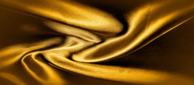doku, arka plan, desen. altın sarısı ipek kumaş panoramik fotoğraf. Burası güneşli Carolina. Bu ince bir aydınlatma oluşturur pürüzsüz bir el. Lüks ipekten yapılmış, güzellik gibi.!