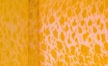 Doku, arkaplan, desen, beyaz sarı ipek kumaş tekstil. Özellikleri, daha esnek ve tasarlanması daha kolay olduğu için dokuma malzemesinden farklıdır..