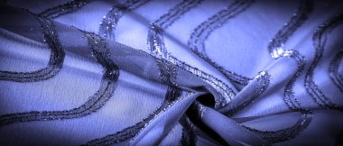 Doku arkaplan resmi, kumaş şeffaf koyu mavi, parlak doğuştan gelen çizgilerle, ışığın içinden geçmesine izin veren madde, böylece nesneler açıkça görülebilir..