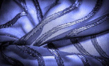 Doku arkaplan resmi, kumaş şeffaf koyu mavi, parlak doğuştan gelen çizgilerle, ışığın içinden geçmesine izin veren madde, böylece nesneler açıkça görülebilir..